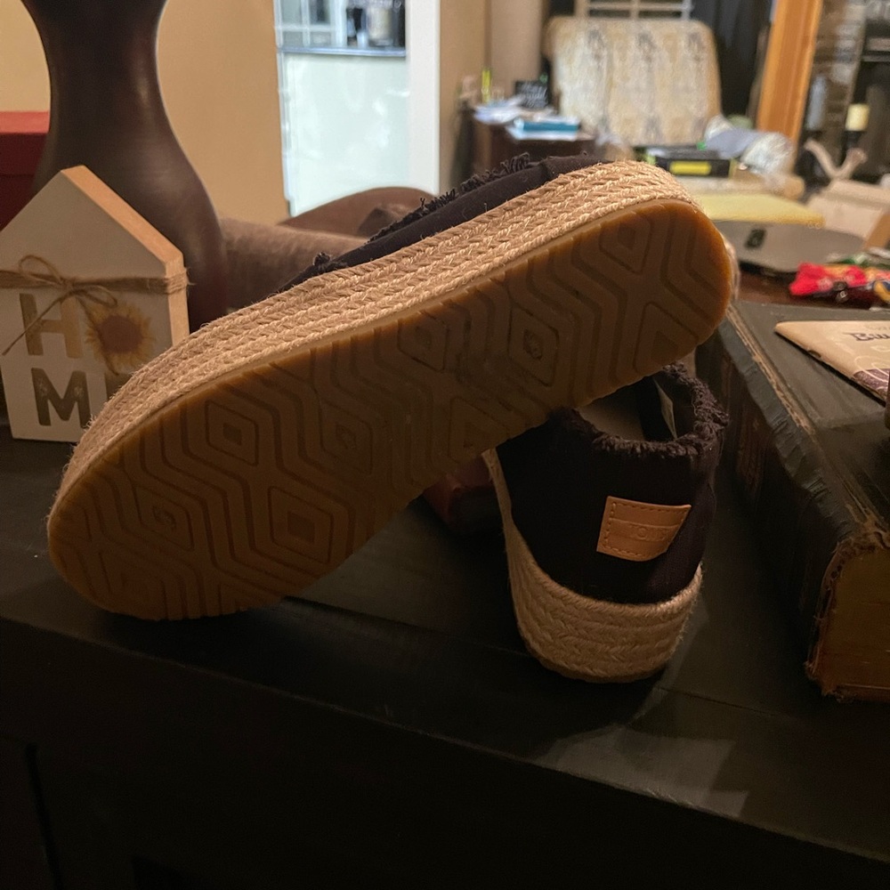 Black plat form slip on boho style Toms, size 9.5. These are a re-posh.